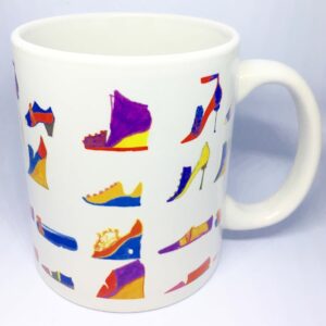 Coffee mug with repeated print of shoes around it