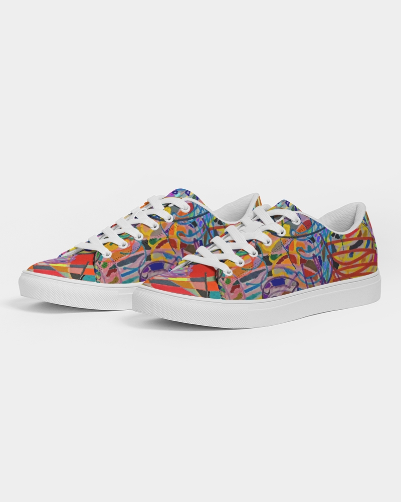 A pair of sneakers with an abstract print design 