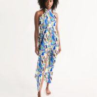 Model wearing a sarong with an abstract art print design.