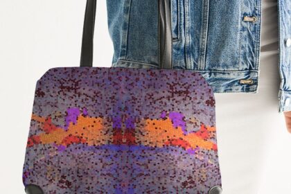 Photo of a model holding a bag with a print design