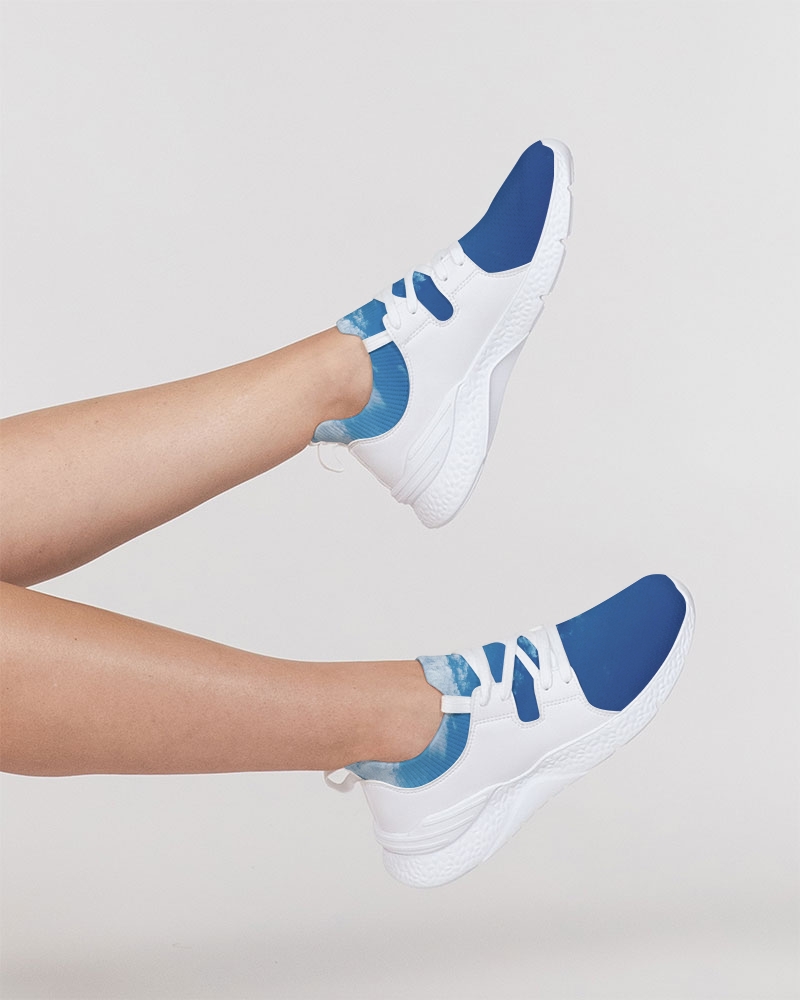 Photo of a model’s legs wearing two tone sneakers 