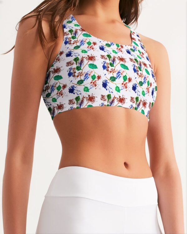 Model wearing sports bra with plants print design